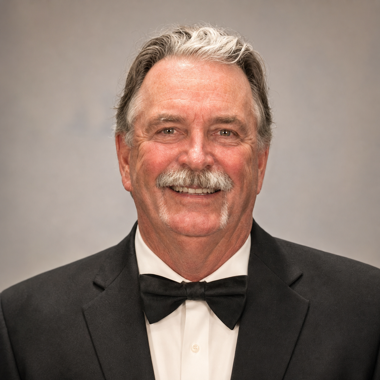 Clyde Pershall in a tuxedo and bow tie